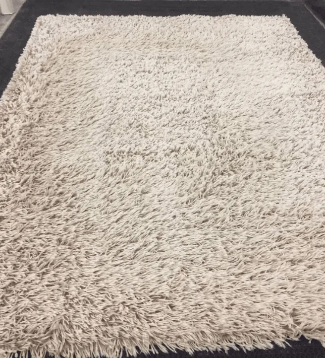 Dirty rug clean again — after cleaning