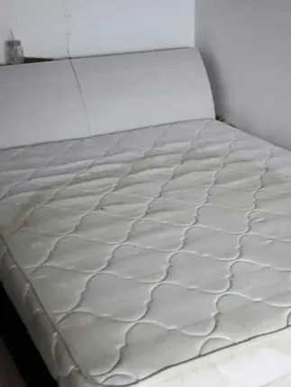 Yellowed mattress refreshed — before cleaning
